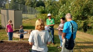 Master Gardener teaching at demo garden.