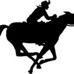 A silhouette of a man riding a galloping horse.