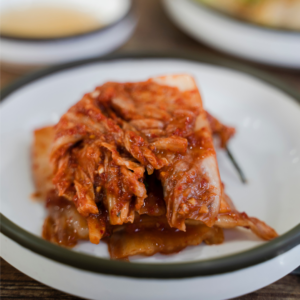 Kimchi on white plate