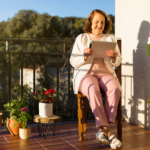 person with an iPad outdoors