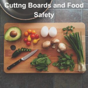 Vegetables on wooden cutting board with knife