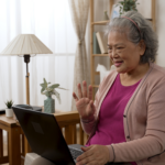 older adult on a computer