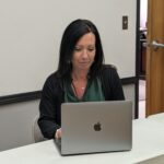 A lady at the computer