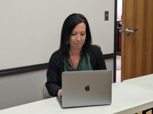 A lady at the computer